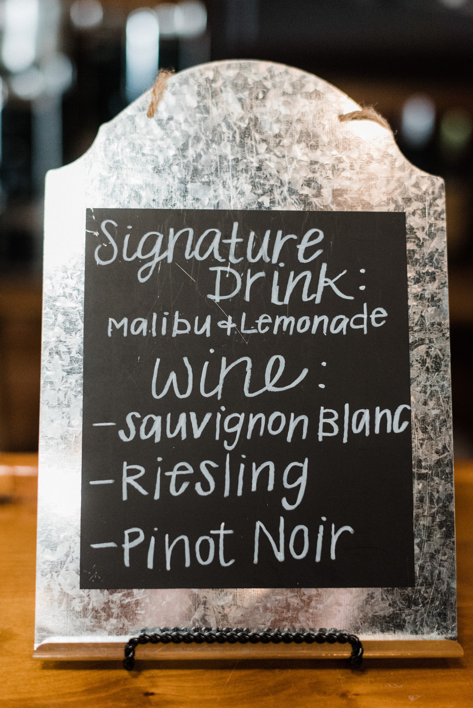Signature bride drink sign with Malibu rum and lemonade; wedding bar sign.
